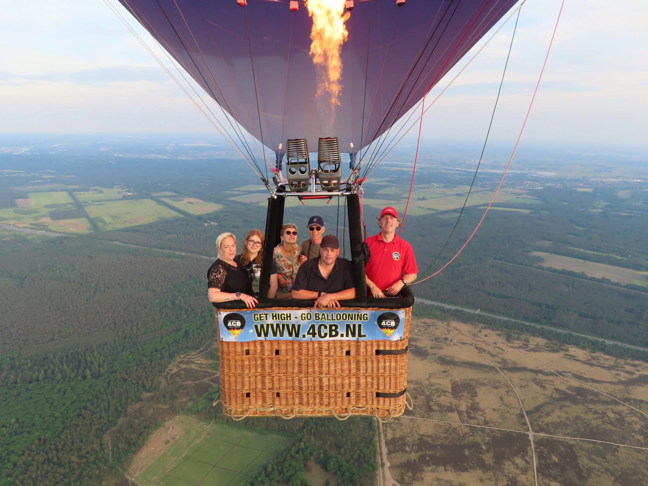 Ballonvaart bij Barneveld met uitzicht over Veluwe en Gelderse Vallei vanuit de luchtballon